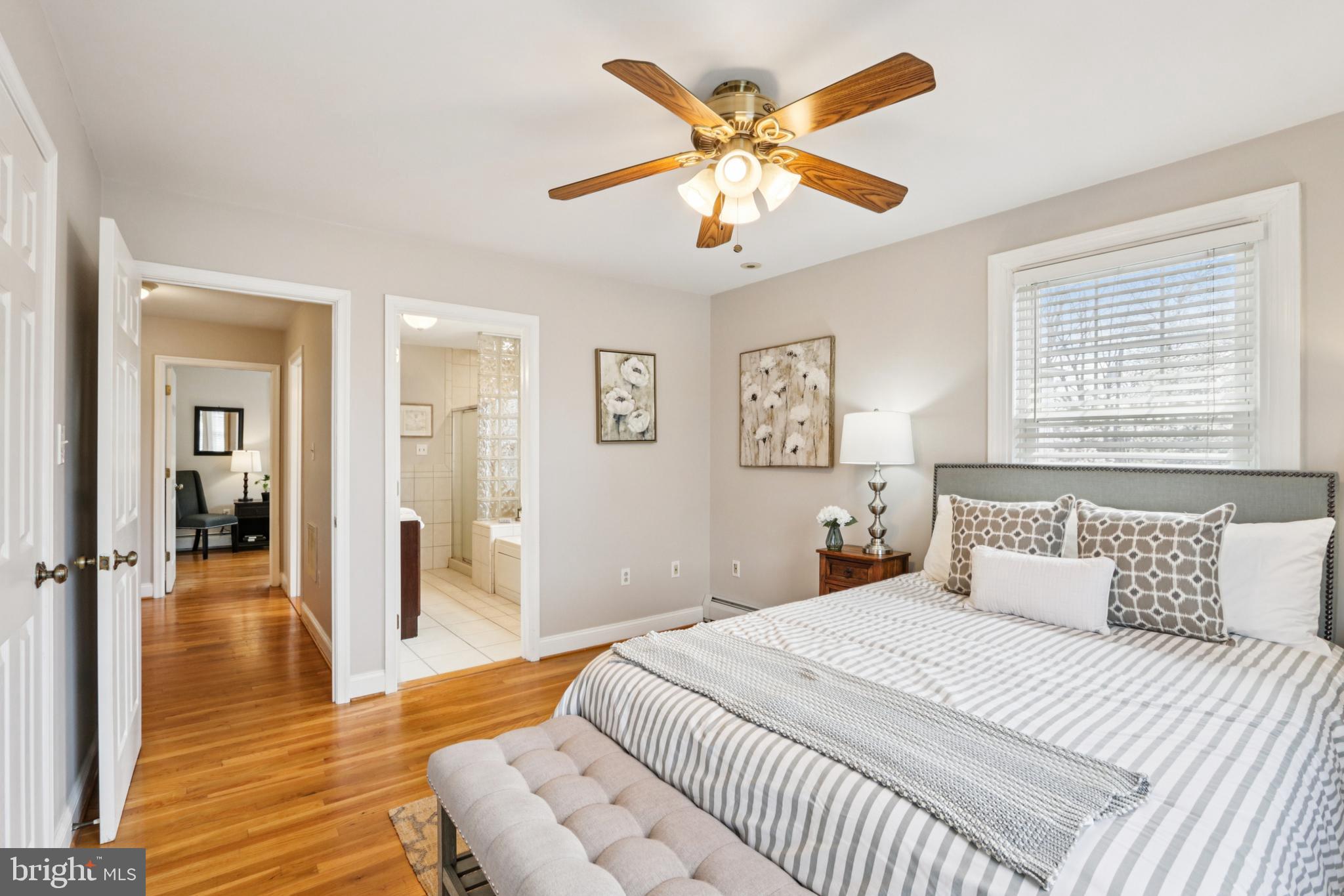 205 North Aberdeen Avenue Wayne, PA 19087 - Photo 22 of 46 a bedroom with a large bed and a chandelier