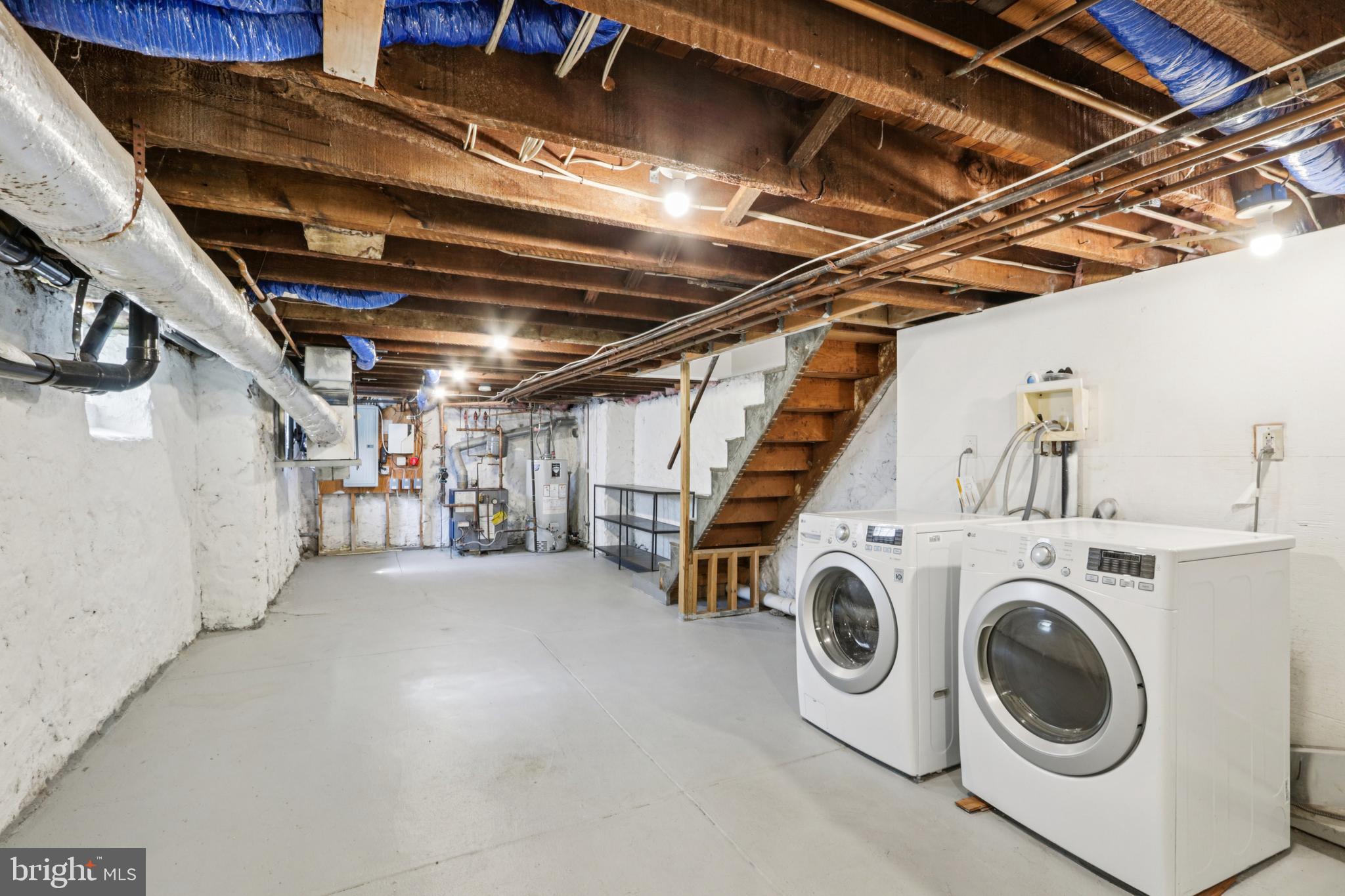 205 North Aberdeen Avenue Wayne, PA 19087 - Photo 33 of 46 a view of storage and utility room with washer and dryer