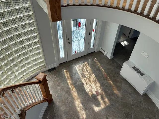 a view of an entryway with a door