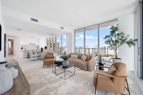 a view of living room with furniture and flat screen tv