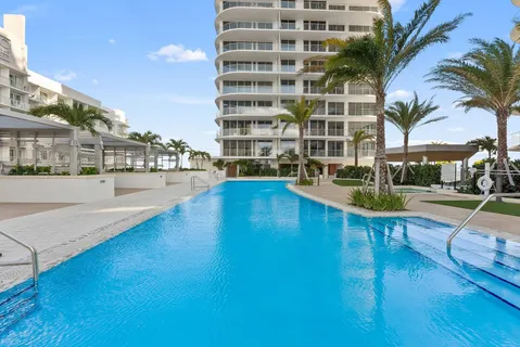 a view of a building with an empty space and balcony