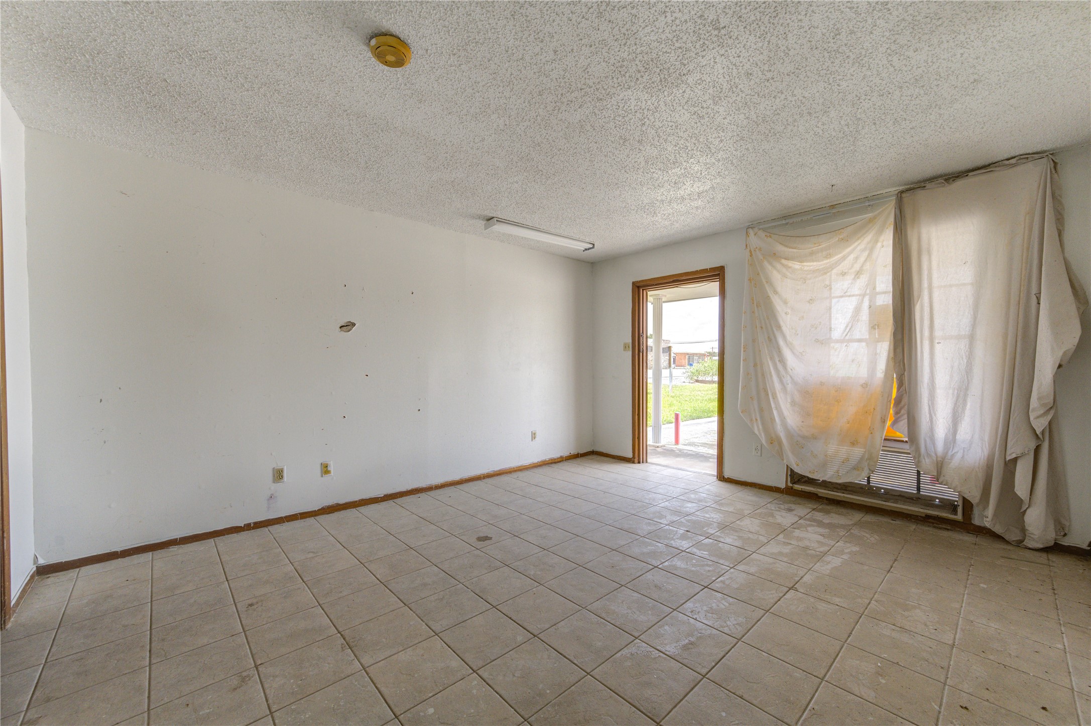 4602 Avenue H Rosenberg, TX 77471 - Photo 36 of 42 a view of a livingroom with window and hardwood floor
