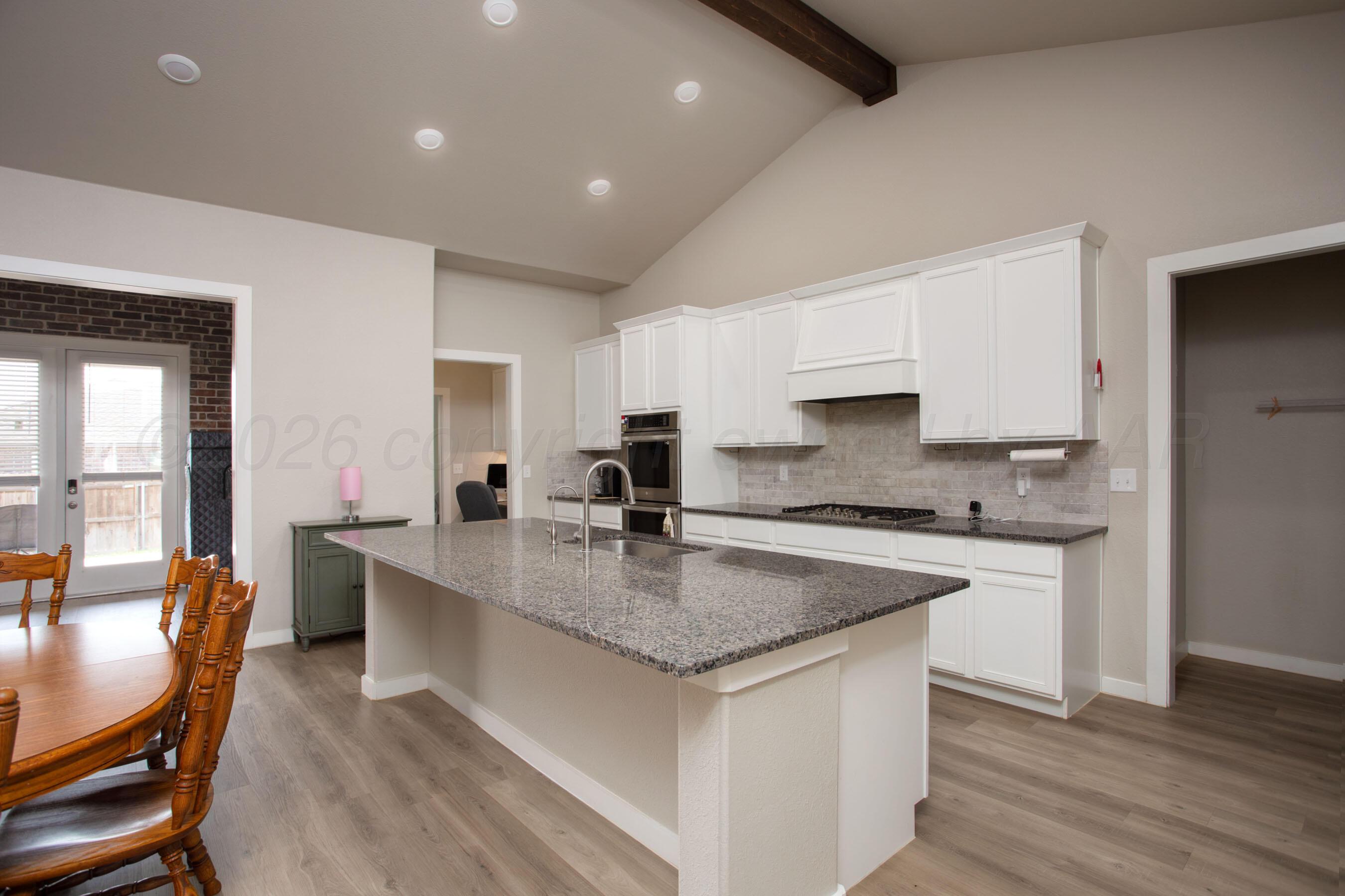 7509 Frazier Road Amarillo, TX 79119 - Photo 8 of 33 Kitchen and Dining Room