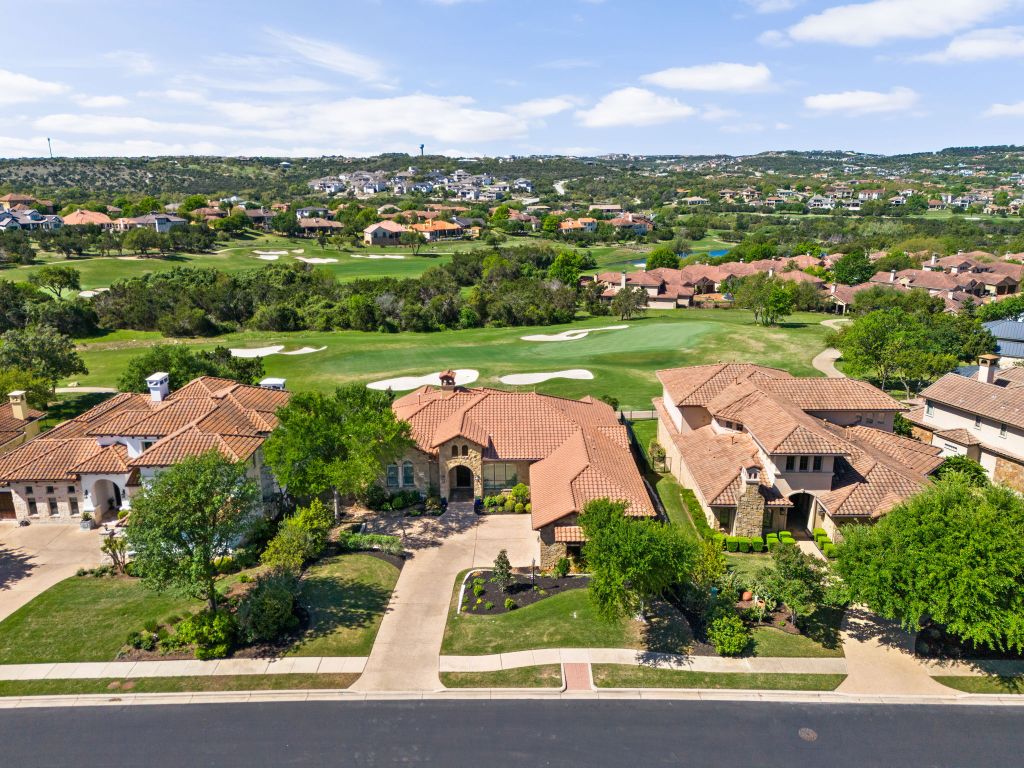 an aerial view of lake residential houses with outdoor space and street view