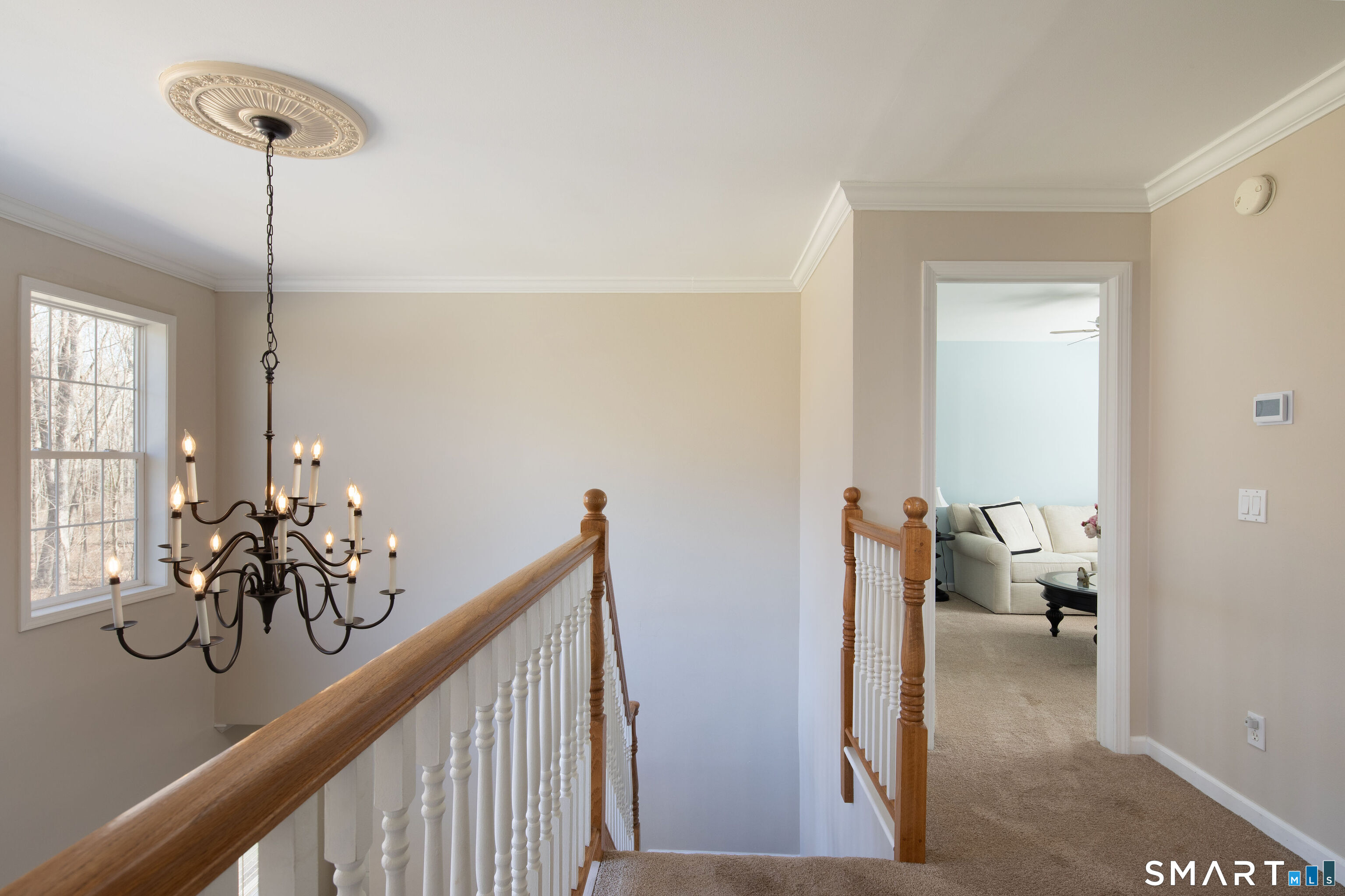 27 Smoke Ridge Drive Sherman, CT 06784 - Photo 24 of 40 Up the open staircase you will find three additional bedrooms.
