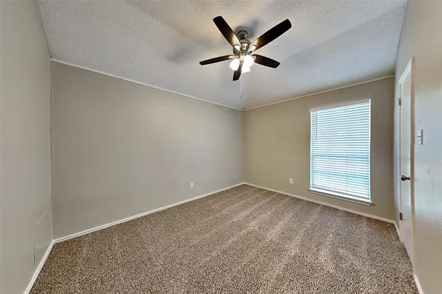 a view of a big room with wooden floor and closet