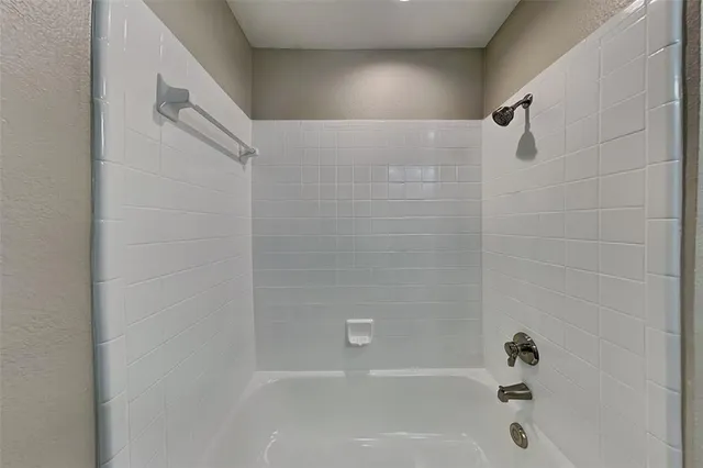 a bathroom with a bathtub