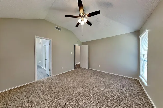 a view of a livingroom with a ceiling fan