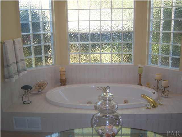 10184 Bittern Drive Pensacola, FL 32507 - Photo 11 of 24 The master bath has a separate shower.