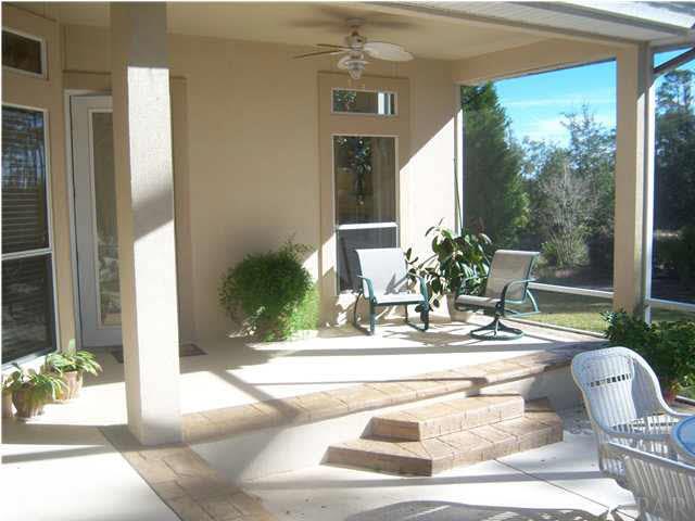 10184 Bittern Drive Pensacola, FL 32507 - Photo 17 of 24 Enjoy the sights and sounds of nature from your screened lanai.