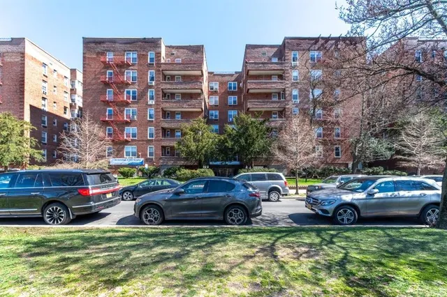 a view of a cars parked in front of a building