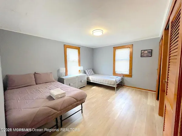 a backyard of a house with outdoor seating