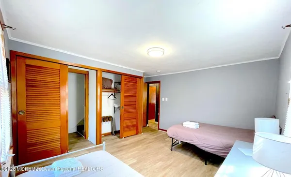 a view of deck with chairs and floor to ceiling window and yard