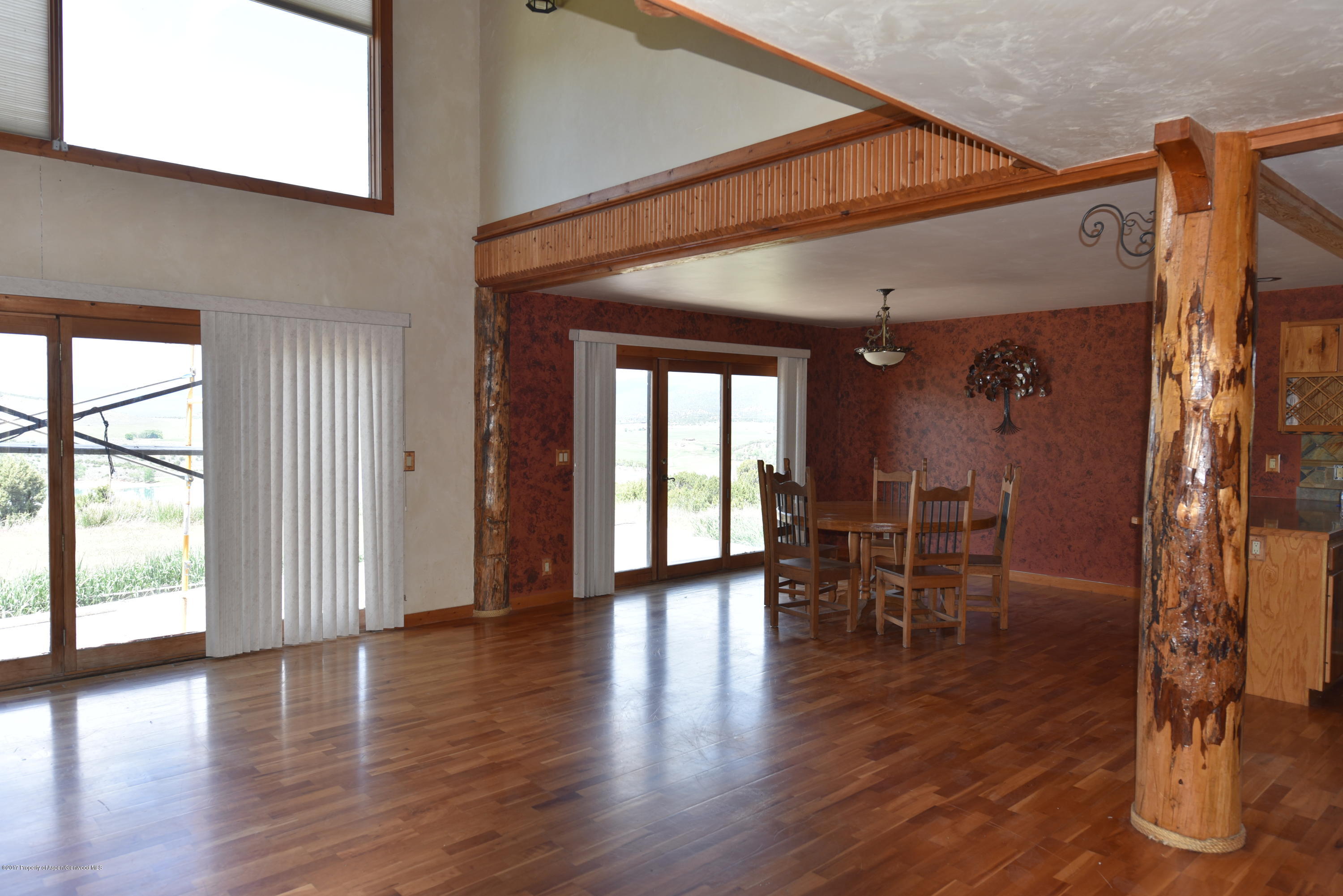 3744 County Road 237 Rifle, CO 81650 - Photo 11 of 37 a view of a livingroom with furniture and wooden floor