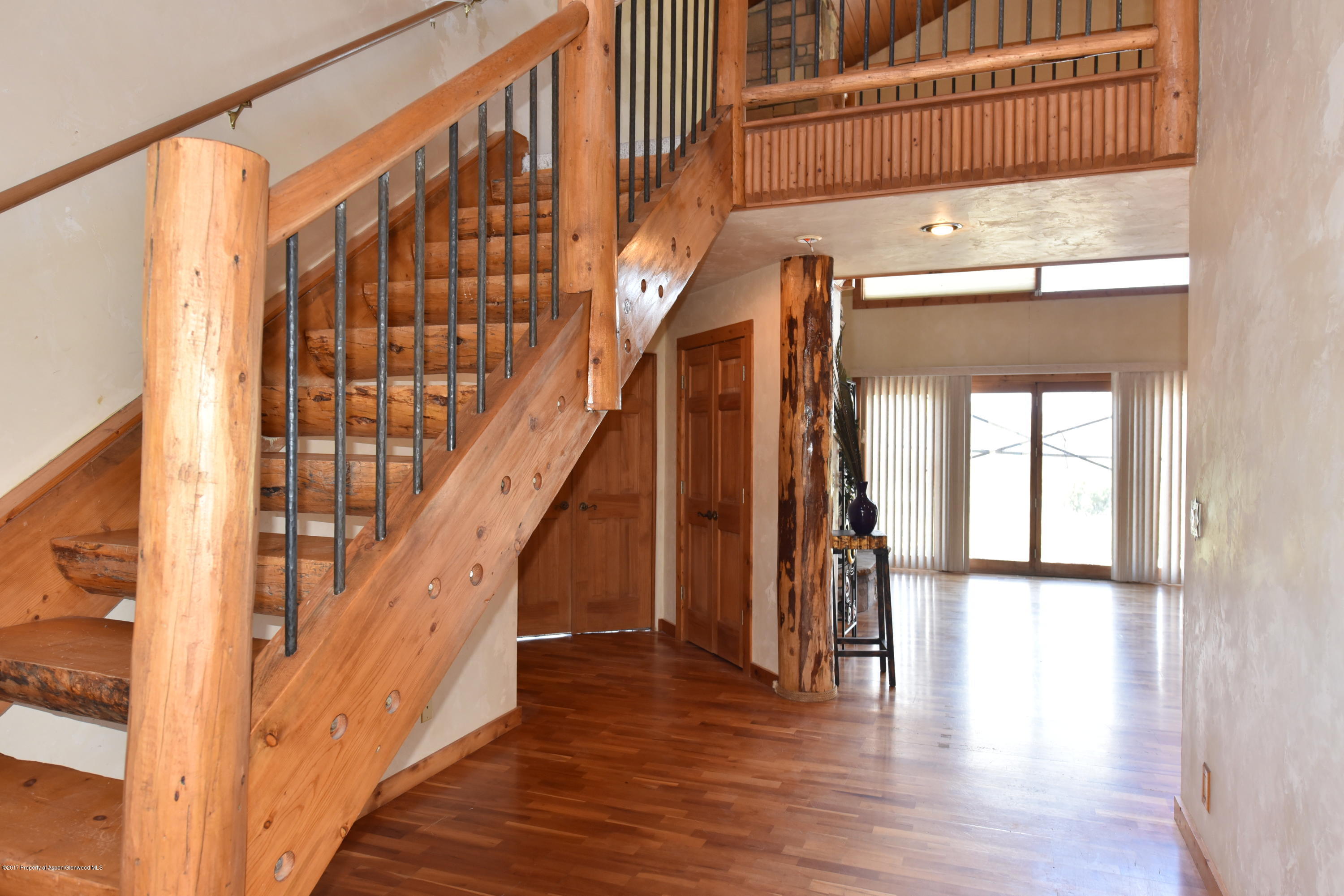 3744 County Road 237 Rifle, CO 81650 - Photo 14 of 37 a view of an entryway with wooden floor