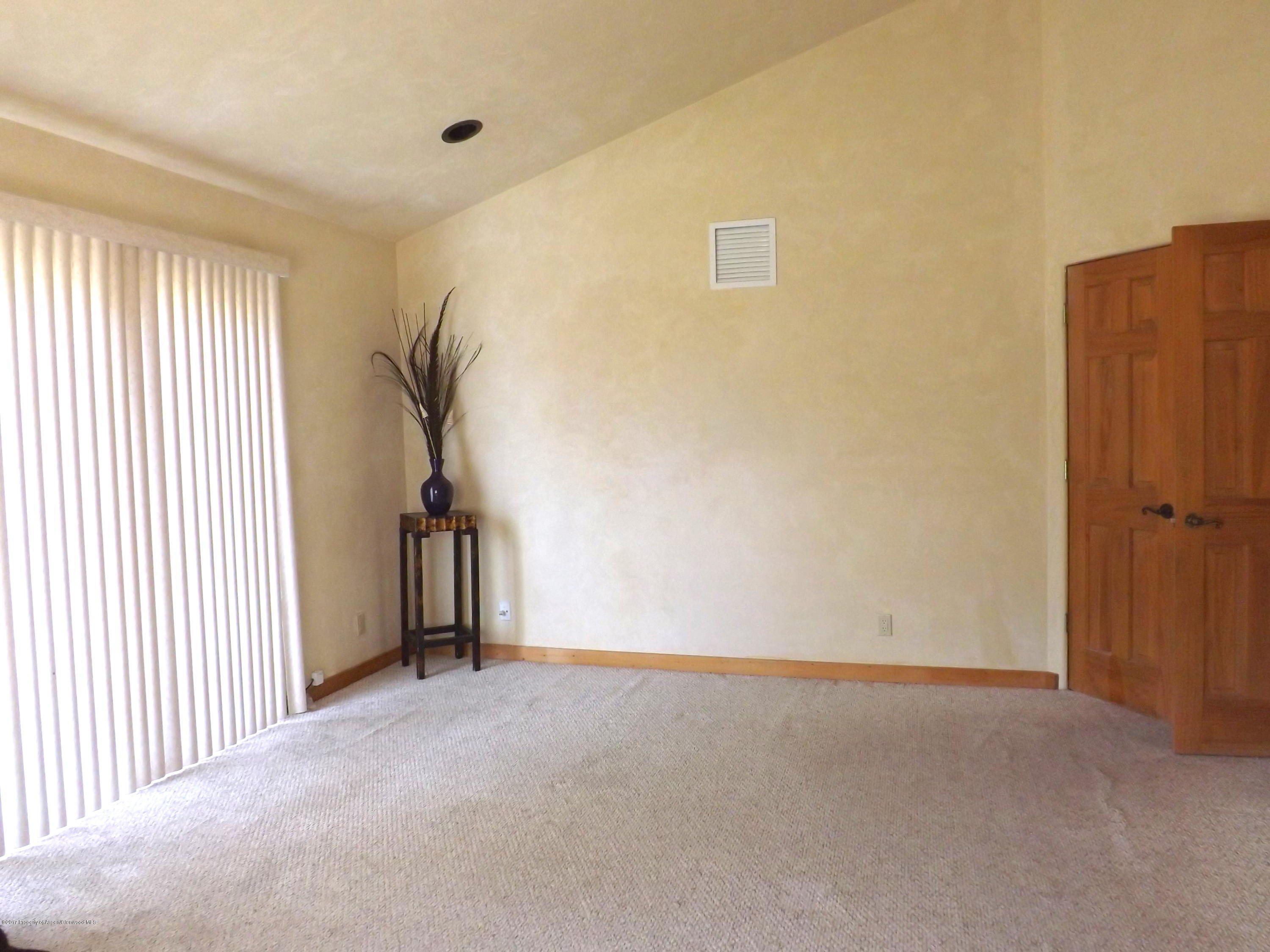 3744 County Road 237 Rifle, CO 81650 - Photo 17 of 37 a view of an empty room with a window