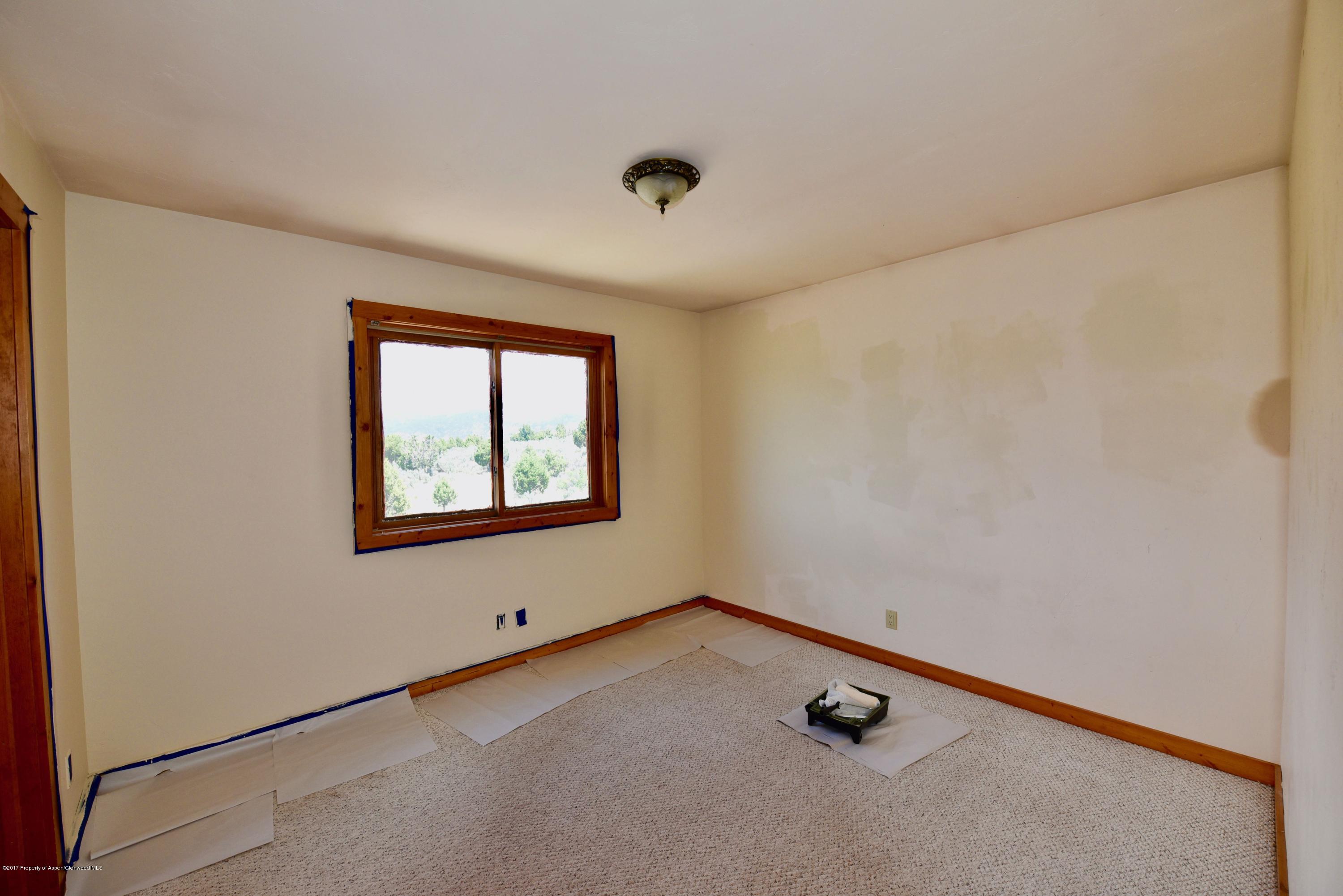 3744 County Road 237 Rifle, CO 81650 - Photo 24 of 37 an empty room with windows