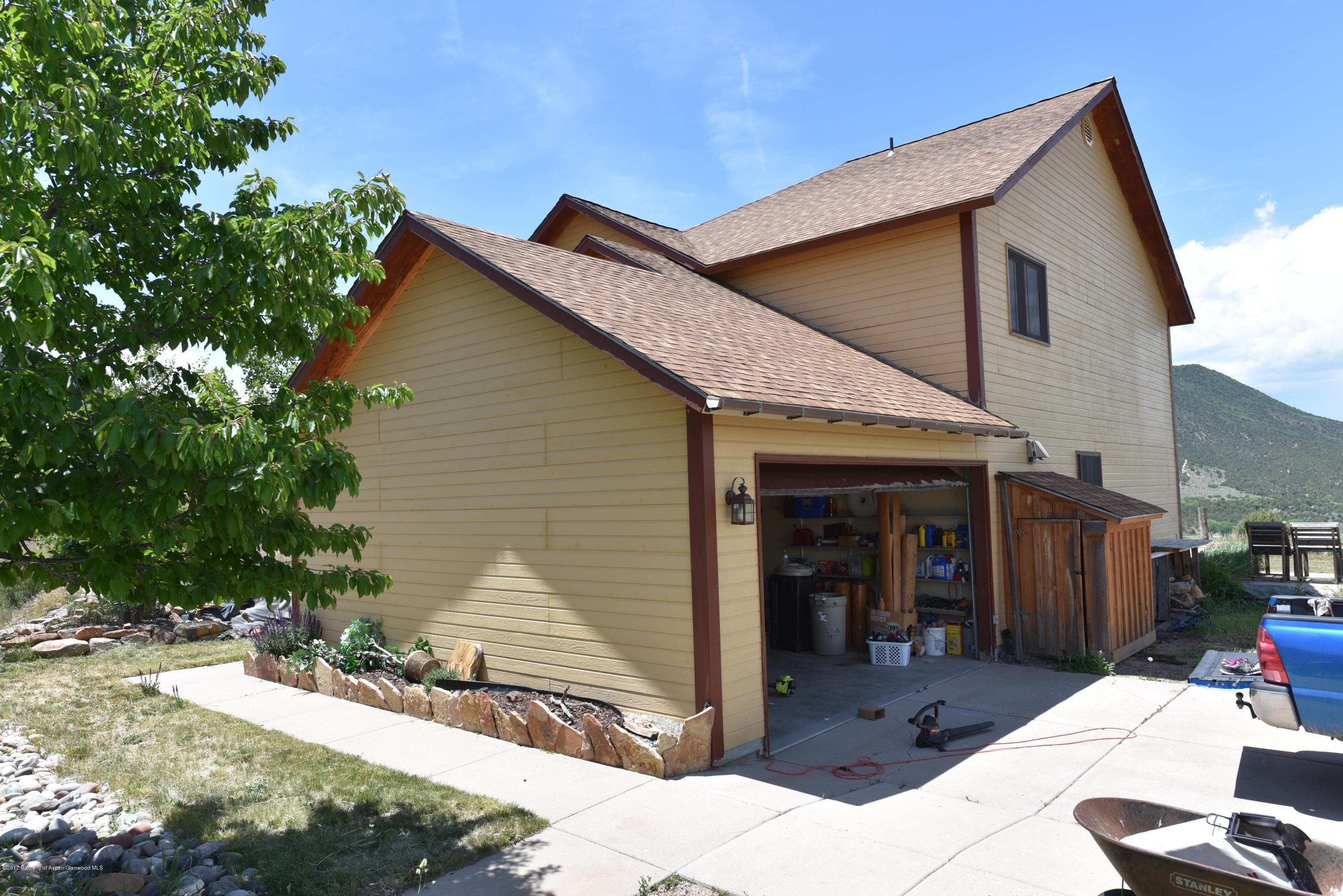 3744 County Road 237 Rifle, CO 81650 - Photo 35 of 37 a front view of a house with a patio