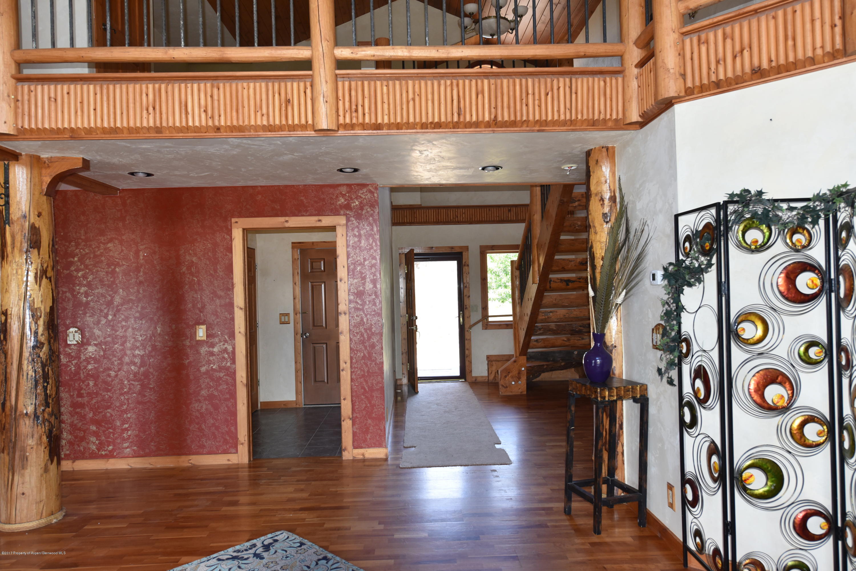 3744 County Road 237 Rifle, CO 81650 - Photo 9 of 37 a view of an entryway with wooden floor