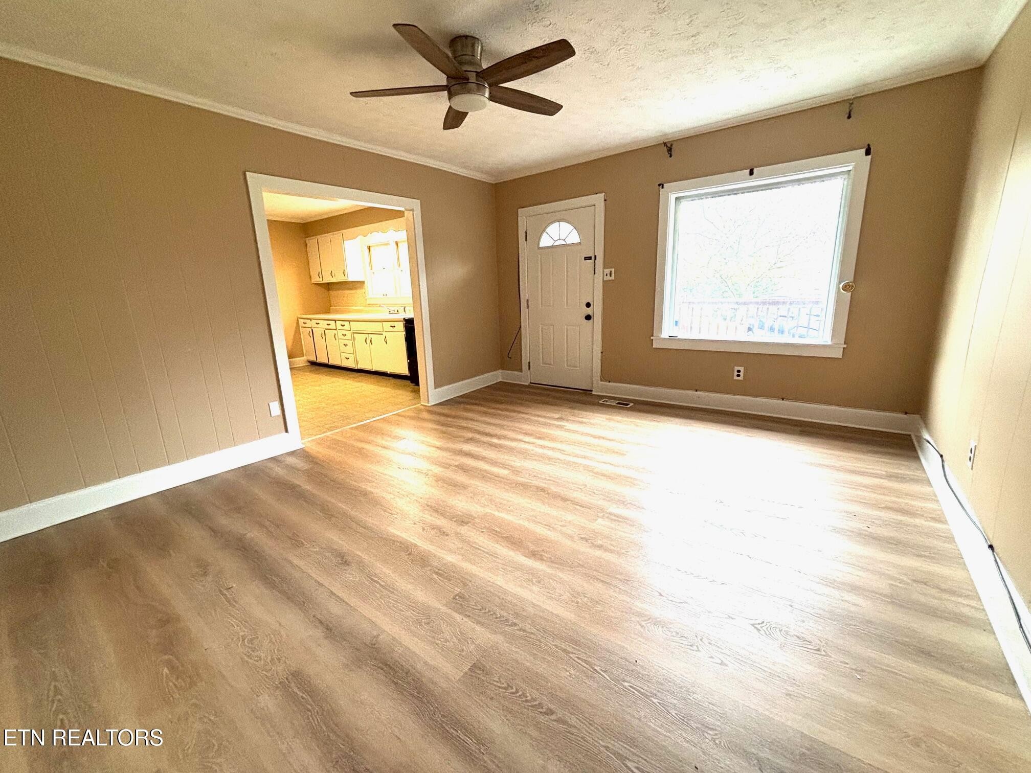7005 Washington Pike, Unit A Corryton, TN 37721 - Photo 4 of 17 a view of an empty room and window