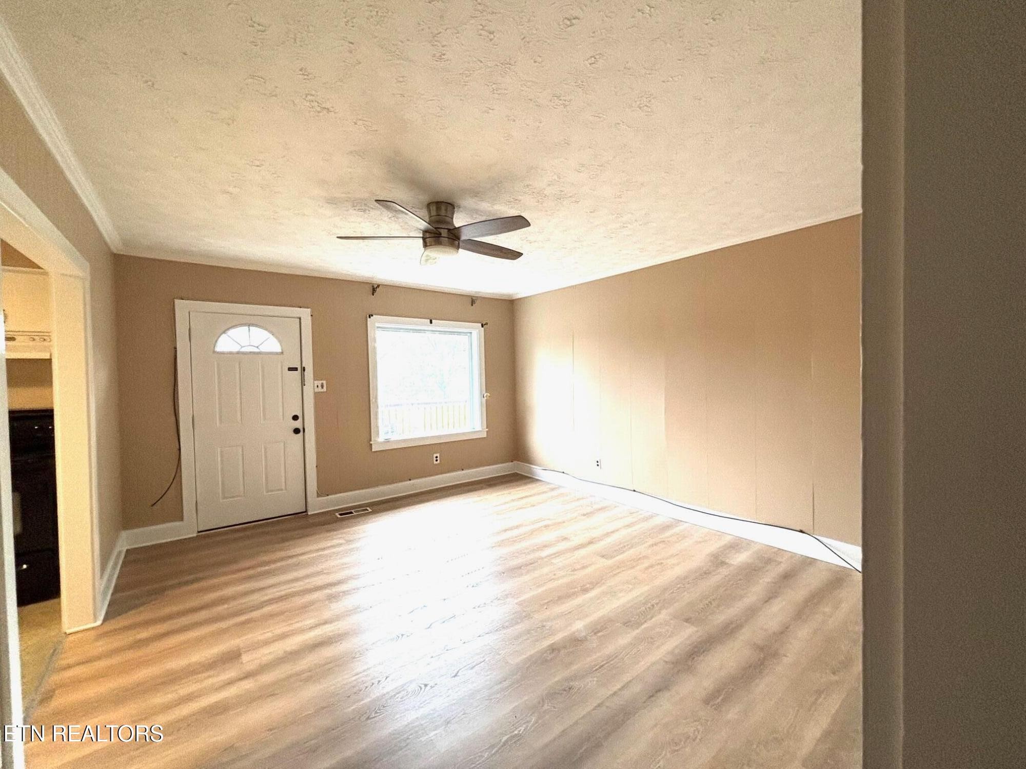 7005 Washington Pike, Unit A Corryton, TN 37721 - Photo 5 of 17 a view of an empty room and window