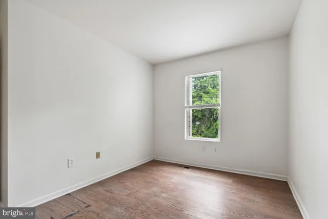 an empty room with window