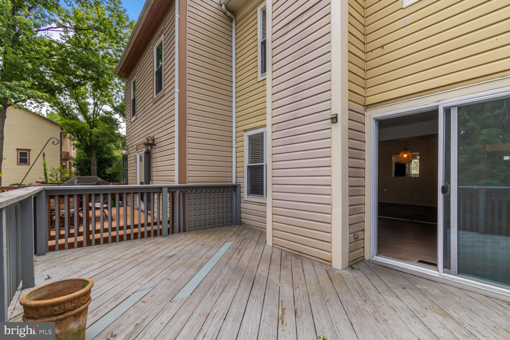 2849 Schoolhouse Circle Silver Spring, MD 20902 - Photo 30 of 31 a view of backyard with deck and wooden floor