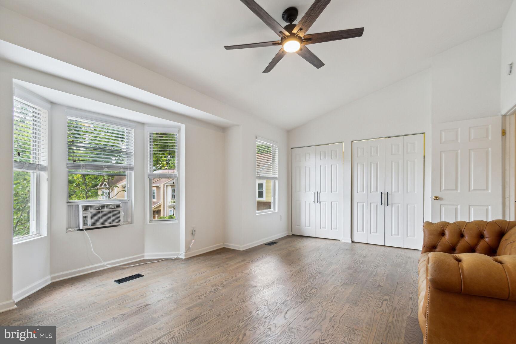 2849 Schoolhouse Circle Silver Spring, MD 20902 - Photo 10 of 31 a living room with furniture and a window