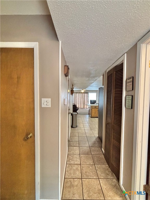 454 15th Street Port O'Connor, TX 77982 - Photo 14 of 45 a hallway with a dining table and a window