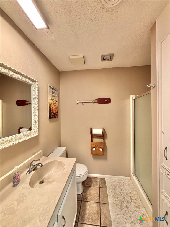 454 15th Street Port O'Connor, TX 77982 - Photo 29 of 45 a bathroom with a sink a toilet and shower