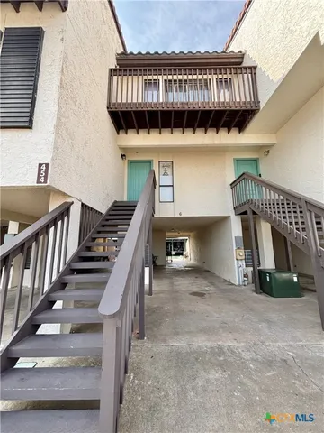 a view of a lake with a house