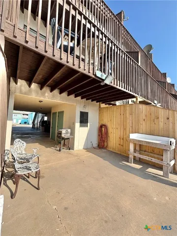 a view of a swimming pool with a lounge chairs