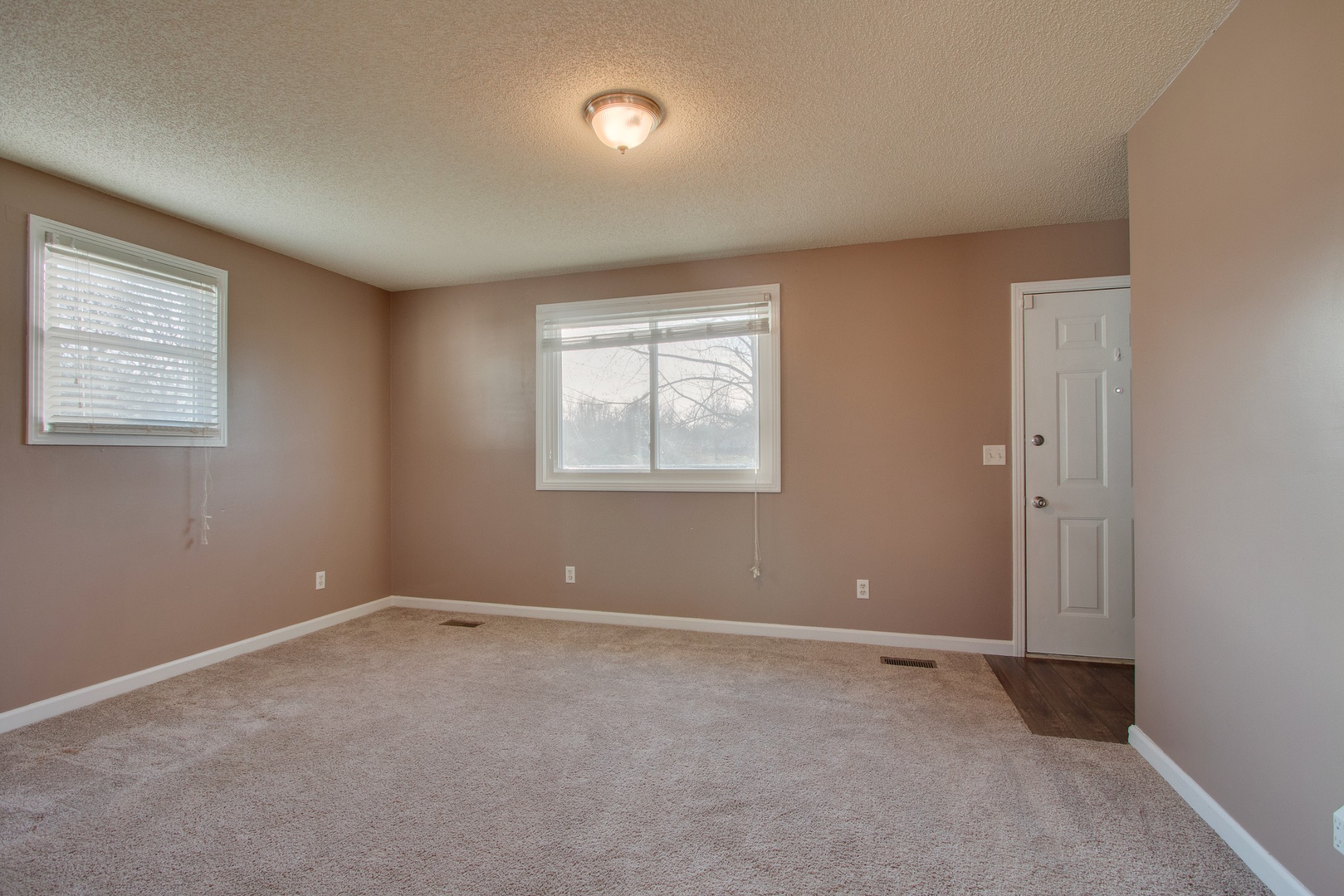 4875 Big Springs Road Lebanon, TN 37090 - Photo 3 of 18 an empty room with windows
