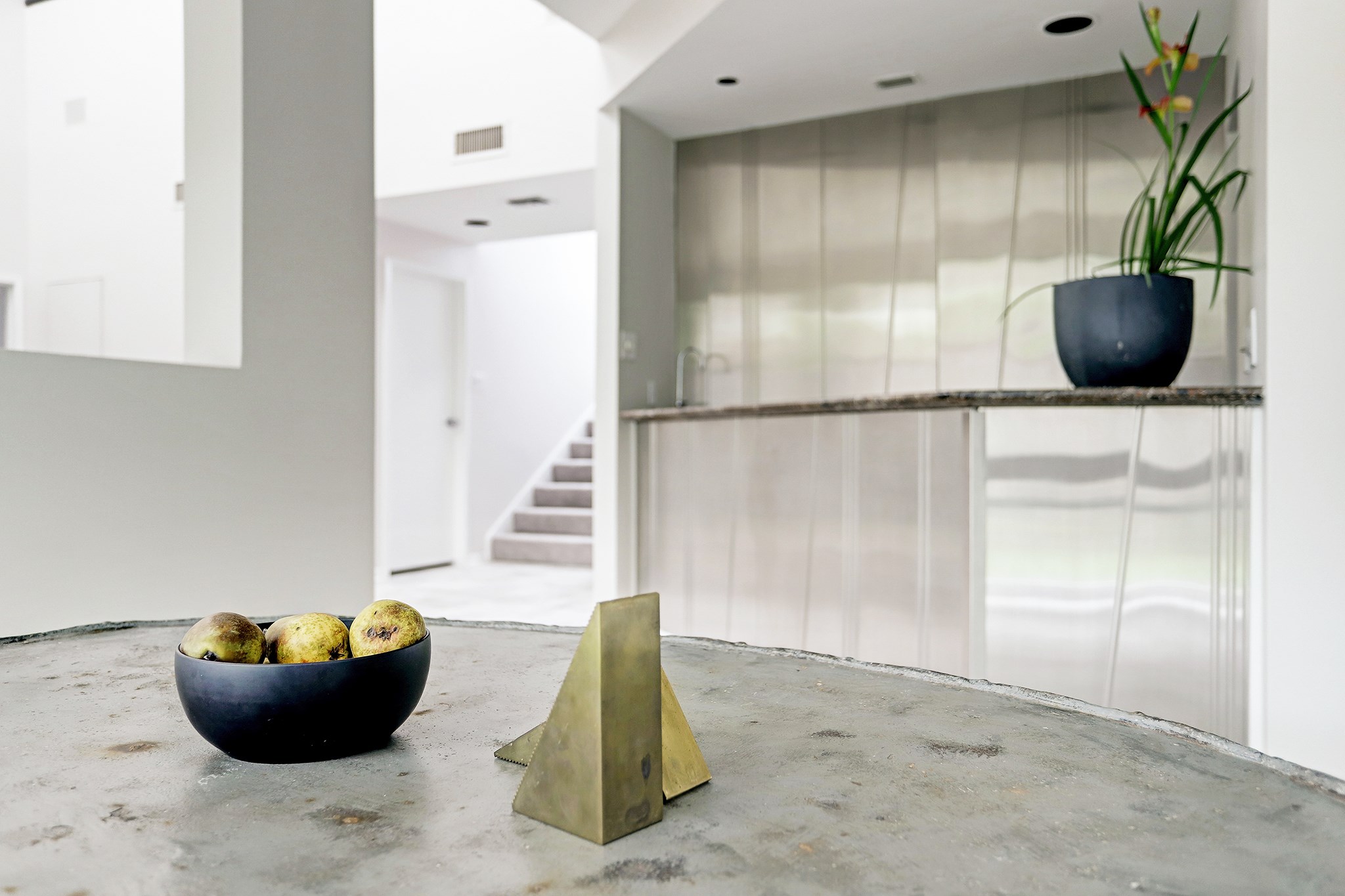 5300 Mercer Street, Unit 9 West University Place, TX 77005 - Photo 7 of 23 The dining room is open to wet-bar. The bar counter would make a handy buffet for serving. There is a built-in wine refrigerator in this stunning wet bar!