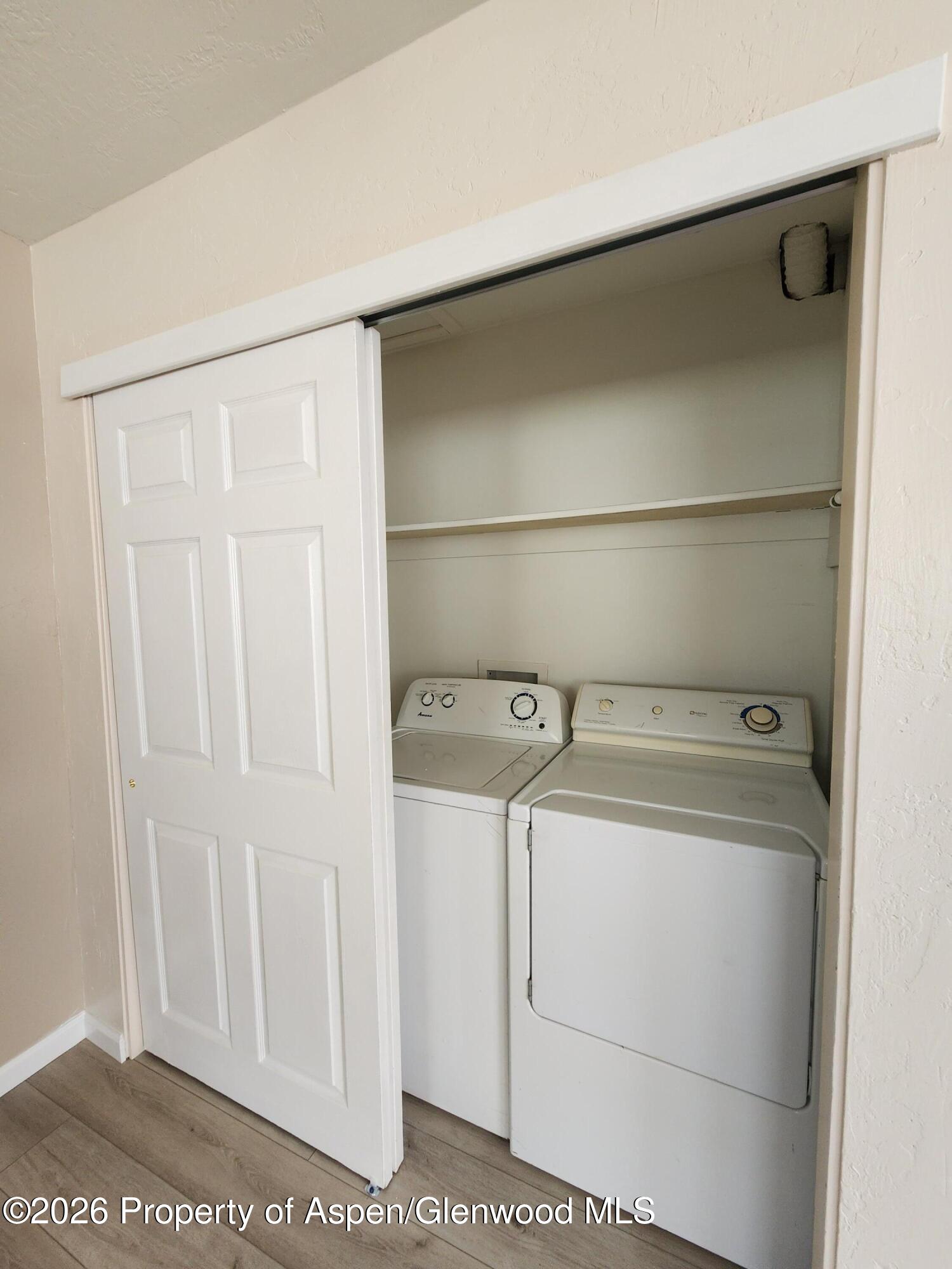 883 Taugenbaugh Boulevard Rifle, CO 81650 - Photo 11 of 18 a utility room with dryer and washer