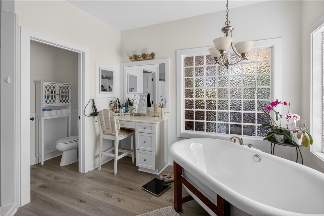 1504 Double Springs Road Townville, SC 29689 - Photo 14 of 41 This serene bathroom offers a peaceful retreat with a luxurious soaking tub.