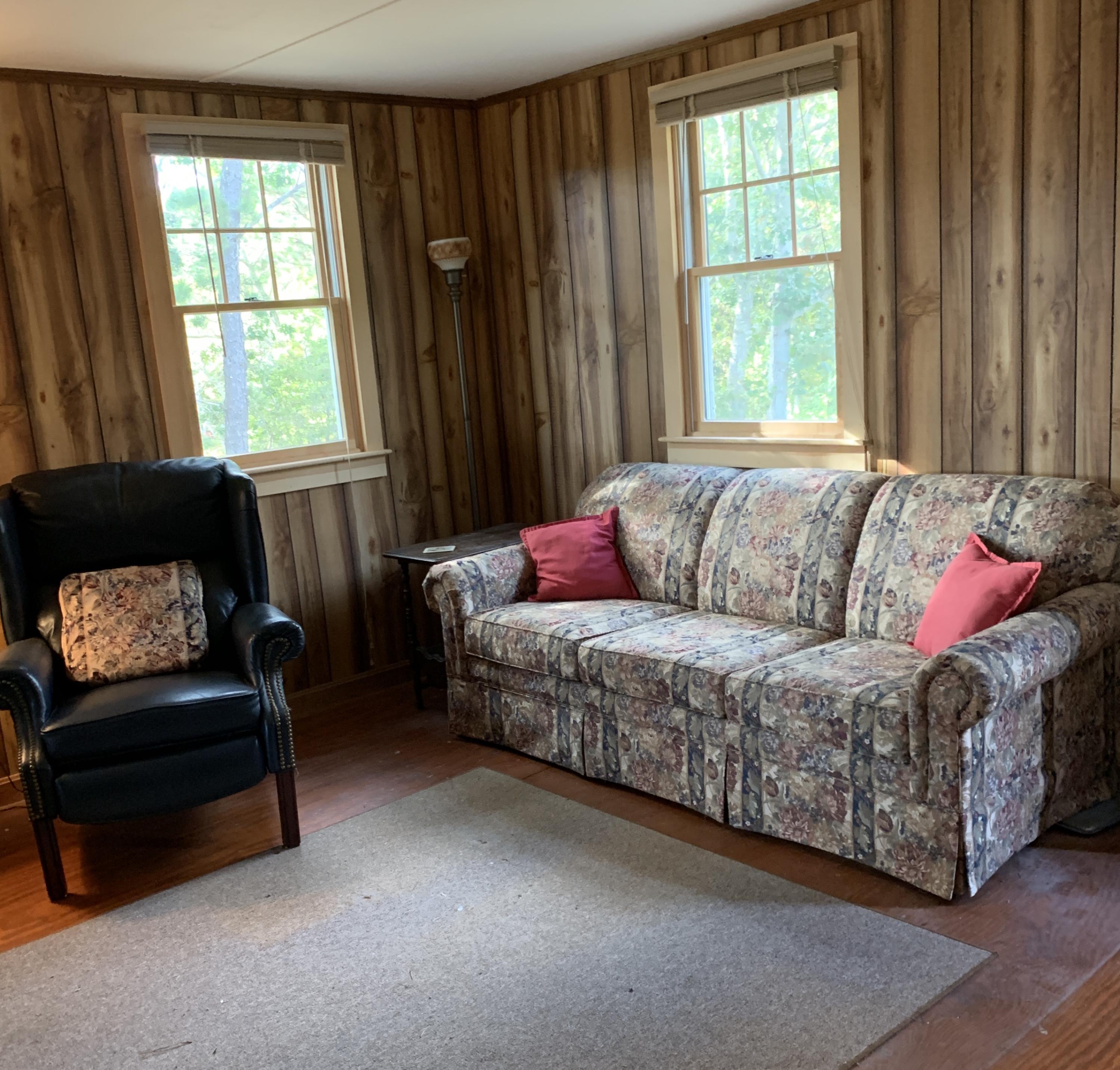 130 Peace Valley Road Wellfleet, MA 02667 - Photo 14 of 28 a living room with furniture and a window