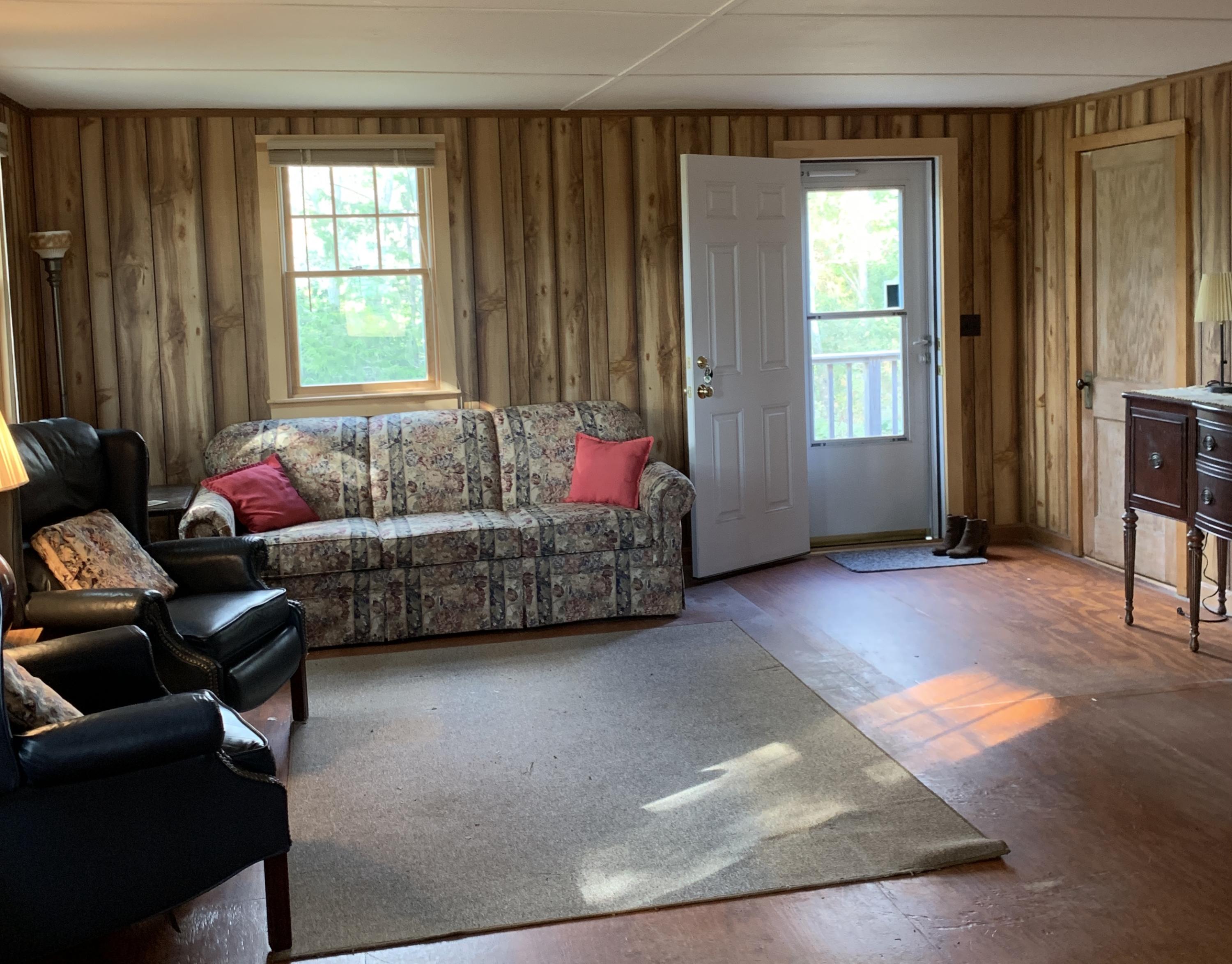 130 Peace Valley Road Wellfleet, MA 02667 - Photo 15 of 28 a living room with furniture and a window