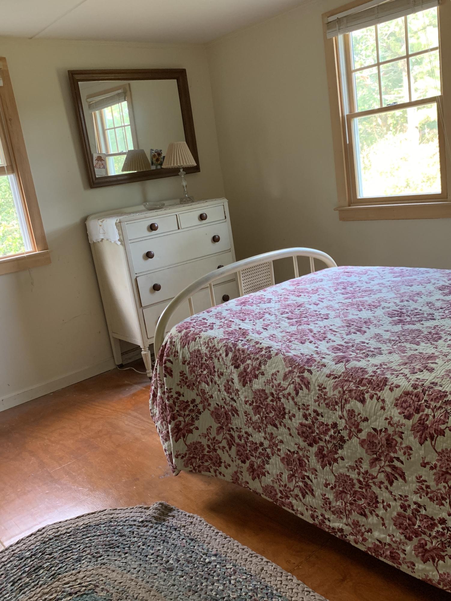 130 Peace Valley Road Wellfleet, MA 02667 - Photo 23 of 28 a bedroom with a bed and window