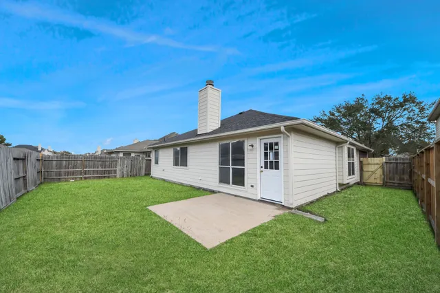 a front view of a house with yard