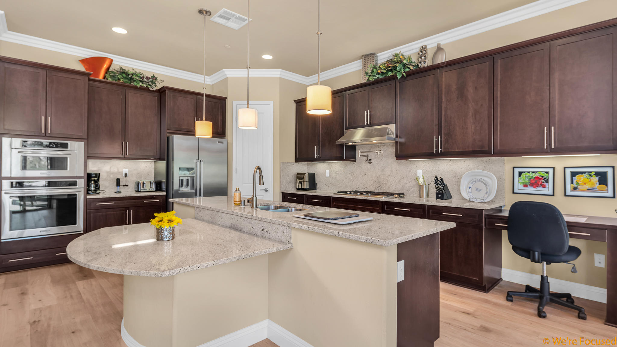 81884 Corte Valdemoro Indio, CA 92203 - Photo 8 of 31 a kitchen with a sink cabinets and wooden floor