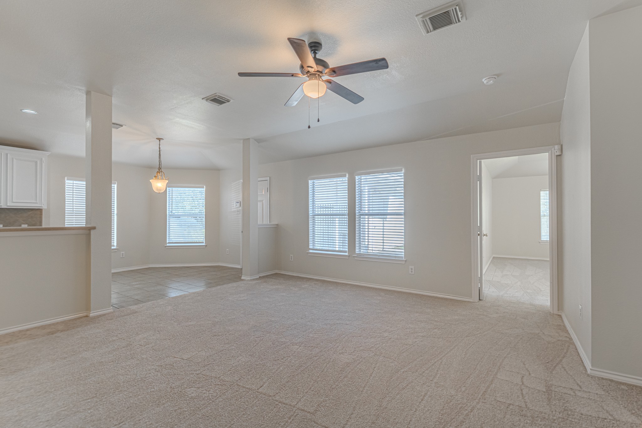 25506 Brisk Spring Court Spring, TX 77373 - Photo 12 of 45 a view of an empty room with a window