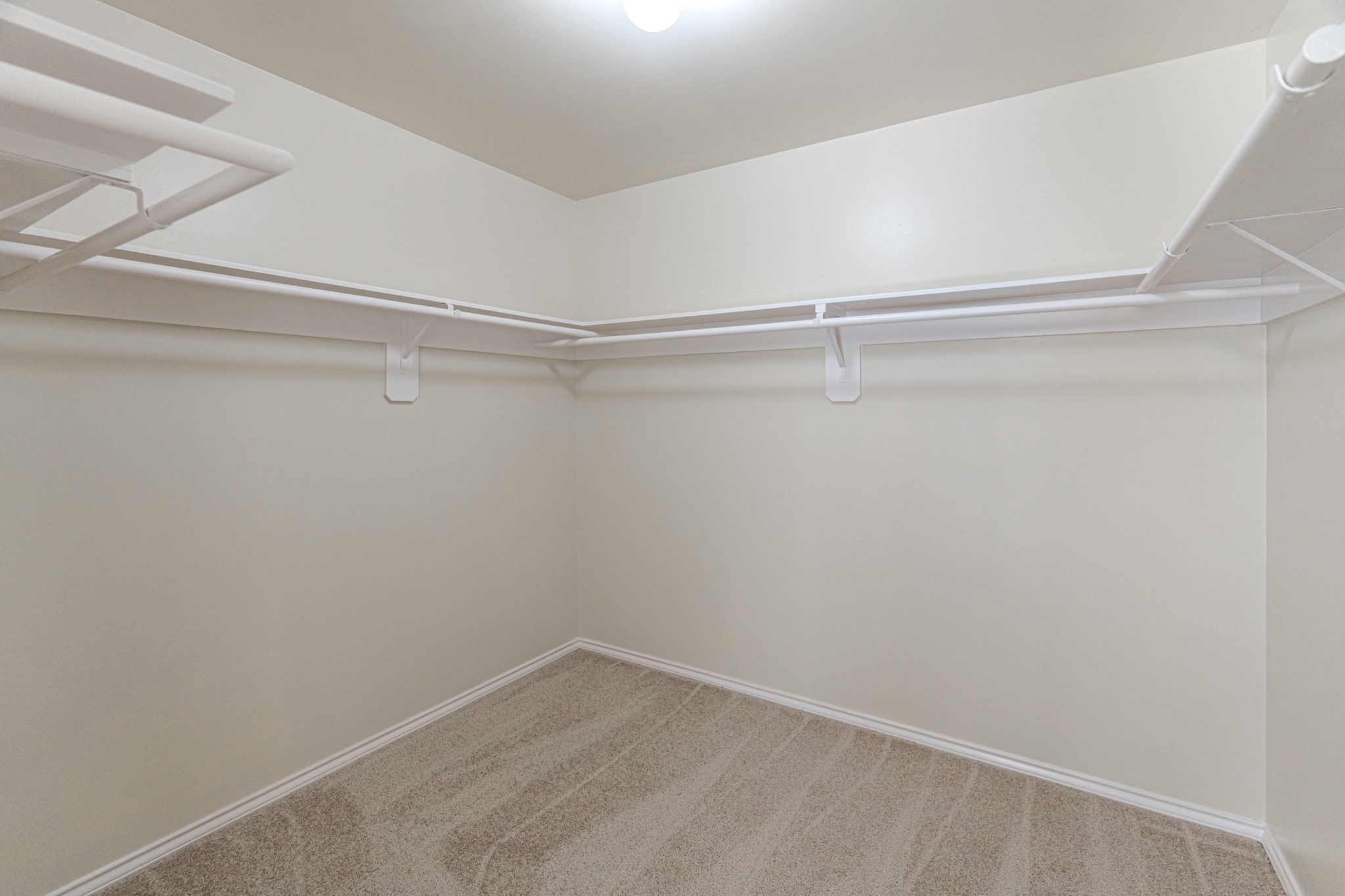 25506 Brisk Spring Court Spring, TX 77373 - Photo 28 of 45 a view of an empty walk in closet