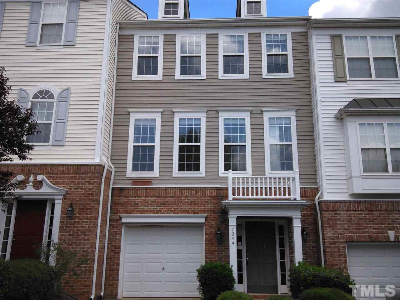 7244 Corvette Court Raleigh, NC 27613 - Photo 2 of 15 a front view of a house with a large windows
