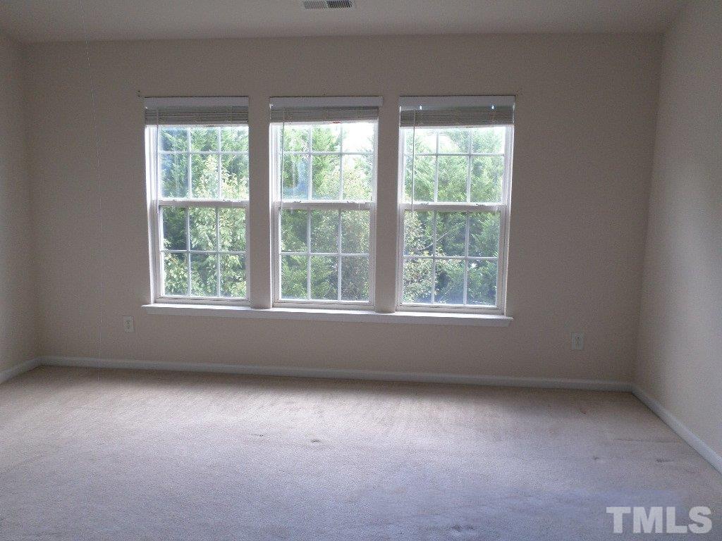 7244 Corvette Court Raleigh, NC 27613 - Photo 11 of 15 an empty room with a window