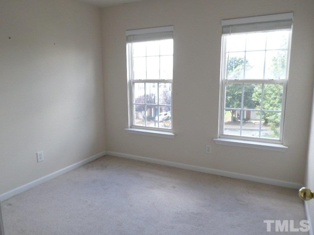 7244 Corvette Court Raleigh, NC 27613 - Photo 13 of 15 an empty room with a window