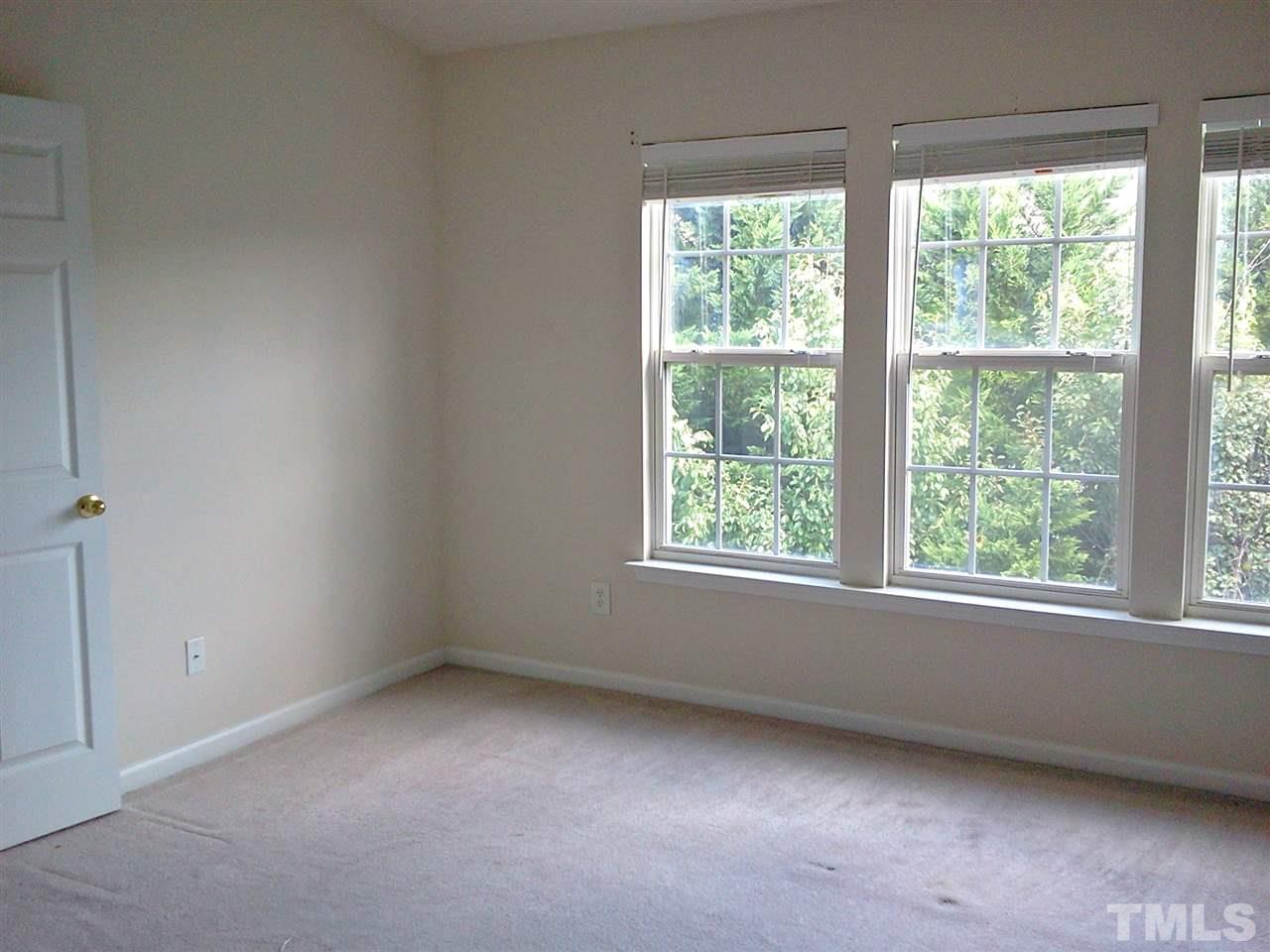 7244 Corvette Court Raleigh, NC 27613 - Photo 10 of 15 an empty room with a window