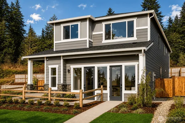 a view of a house with backyard