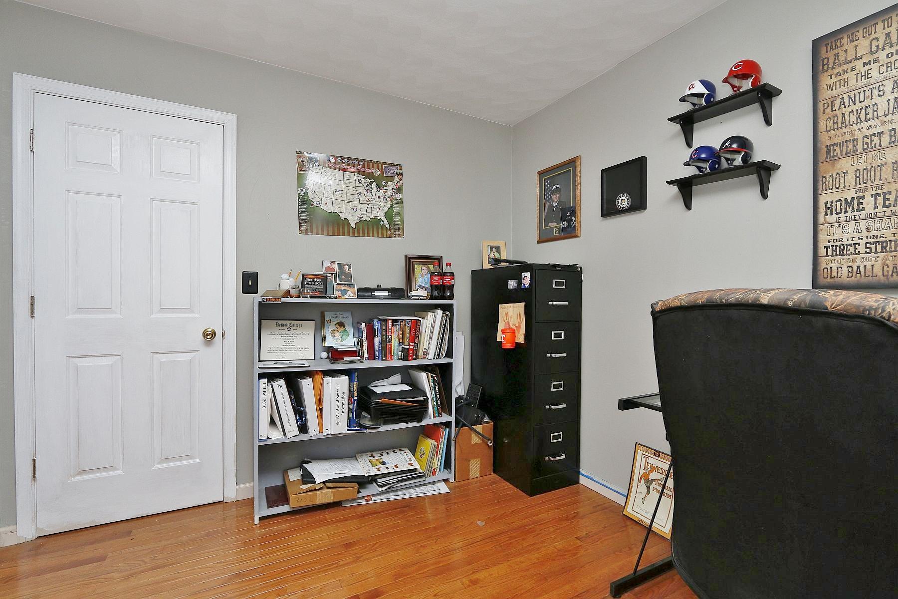 1229 Rabbit Run Road Goodview, VA 24095 - Photo 22 of 35 a view of a workspace with furniture and closet