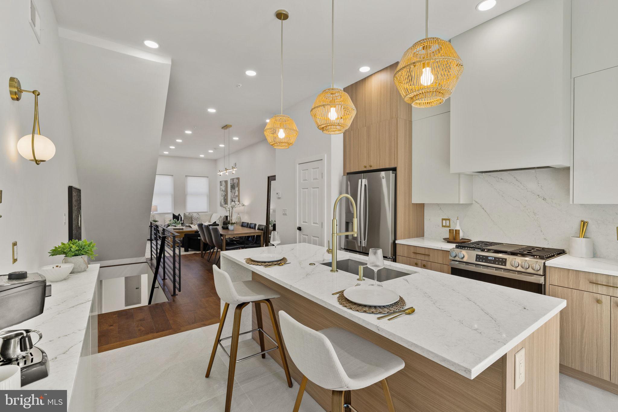 1709 North 4th Street Philadelphia, PA 19122 - Photo 13 of 50 a kitchen with a table and chairs in it